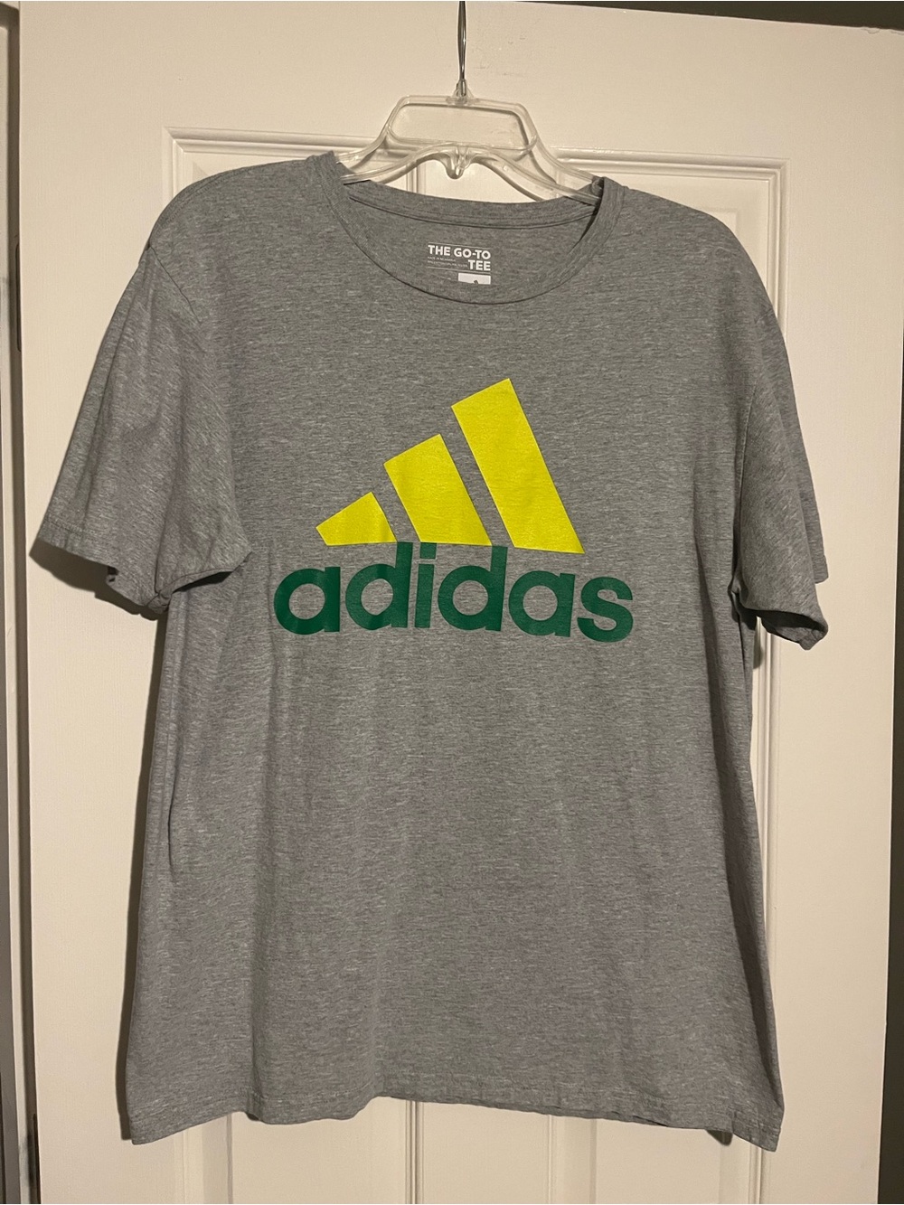 adidas Gray Short-Sleeve Tee with Yellow Logo and Green Wordmark